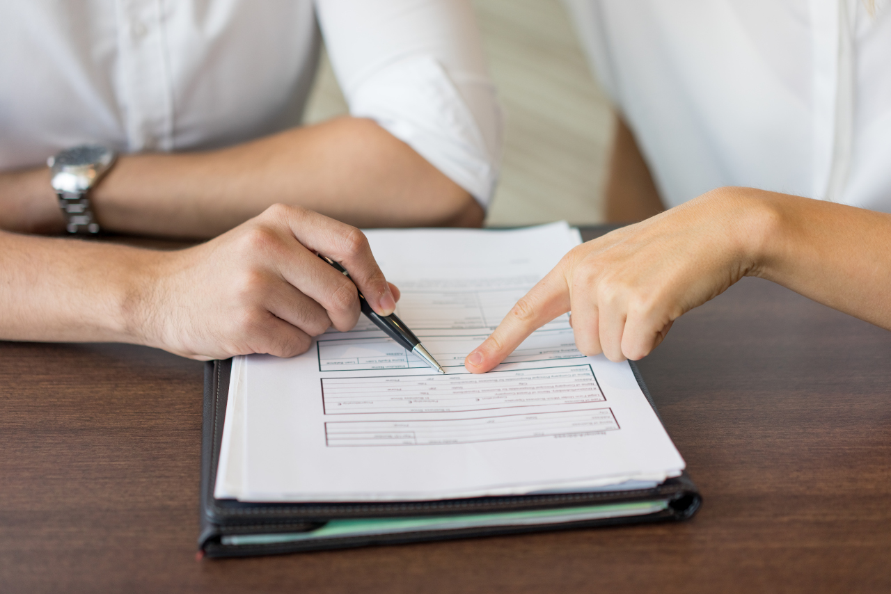 Hands of businessman and businesswoman discussing agreement